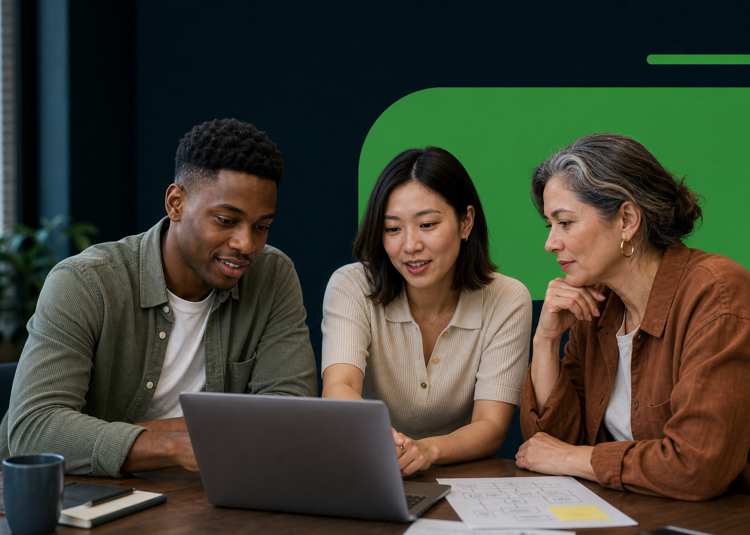 Technology professionals collaborating around a digital platform plan